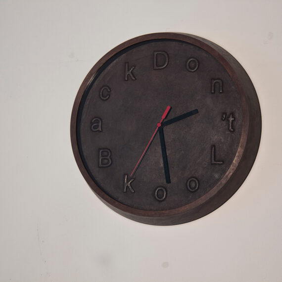 Iván Capote b. 1973, Cuba No Rearview Mirror, 2008–16 Bronze and clock mechanism 13 inches (diameter)