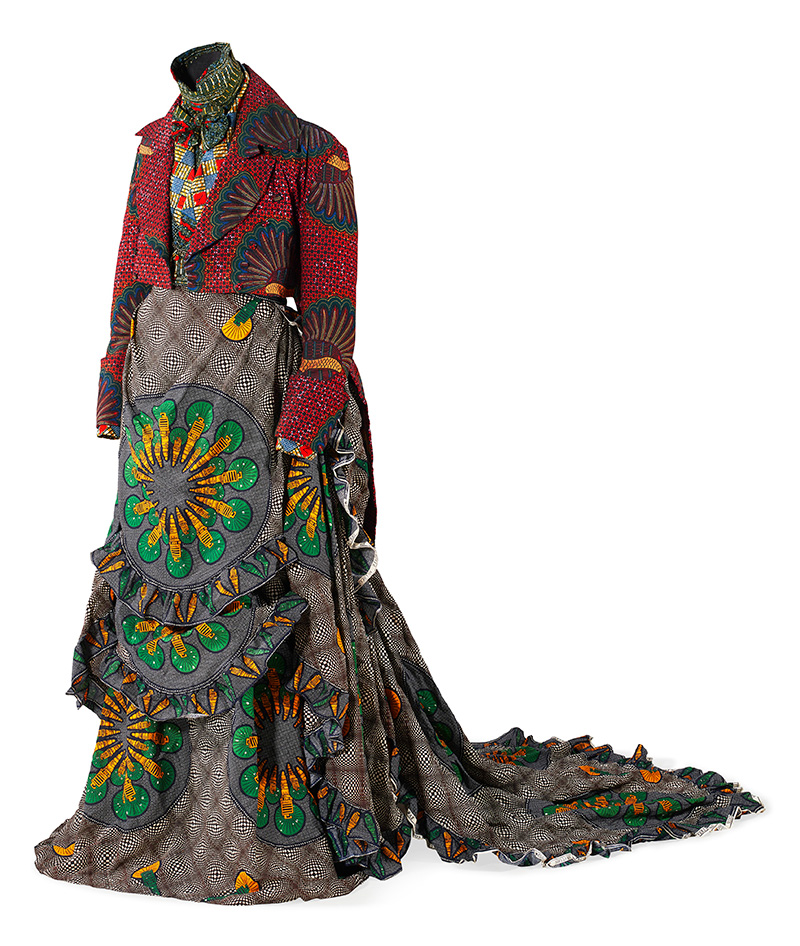 Yinka Shonibare (b. 1962, United Kingdom) Girl/Boy, 1998 Wax cotton printed textile, metal chain, and mannequin