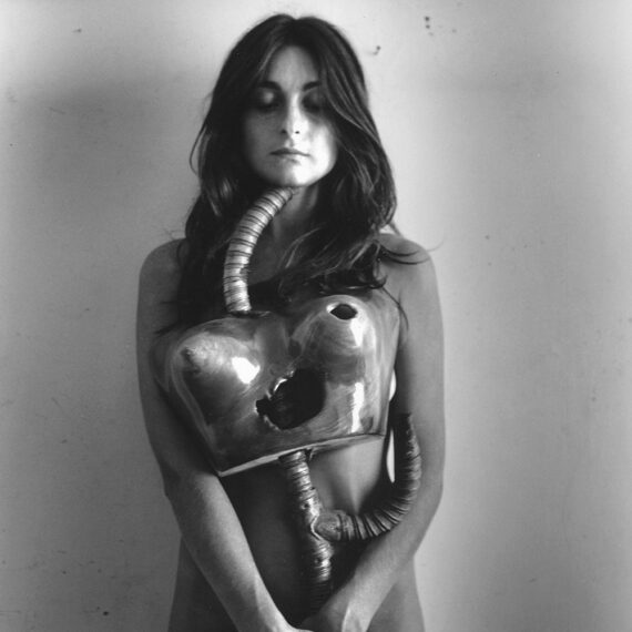 Liliana Maresca (b. 1951, Argentina; d. 1994, Argentina) Untitled. Liliana Maresca with her artwork., 1993 (printed 2004-16) Performance photograph Ilford Selenium gelatin silver print on Ilford fiber paper, ed. of 10 + AP Photo by Marcos López