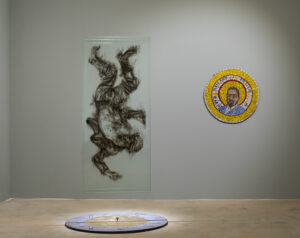 Diane Victor b. 1964, South Africa Between a Major and a Minor, ca. 2018 Glass panel with smoke drawing, mosaic on board, and mixed media