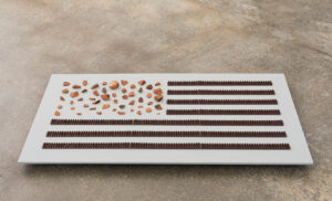 Carlos Martiel b. 1989, Cuba El rey desnudo, 2020 United States flag made of brick fragments and anti-climb security spikes