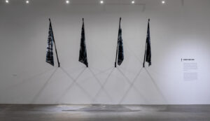 Rowan Smith b. 1983, South Africa Trash Nationalism, 2020 Aluminum and poly sheen fabric flags