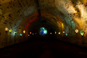 Tania Candiani b. 1974, Mexico Substrata, 2025 16 hand-blown glass sculptures, custom metal support structures, and light system. Dimensions variable